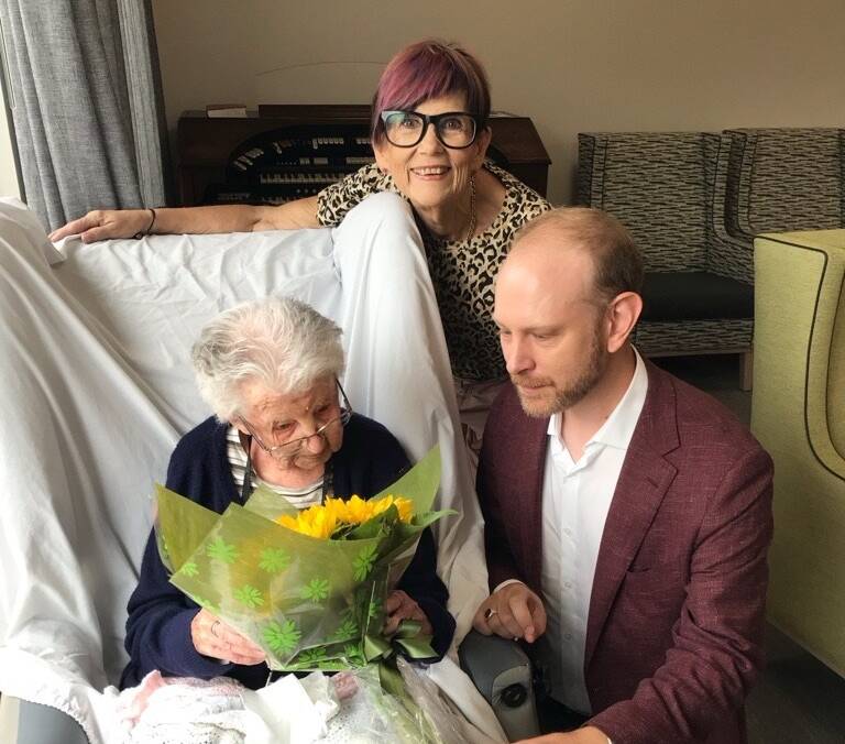 Tom Symondson and Liz Behjat congratulate Laurence Grovermann. Picture supplied