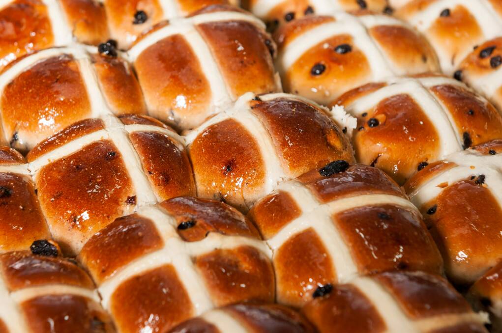 Our beloved hot cross buns are shrinking in size but not cost. File picture