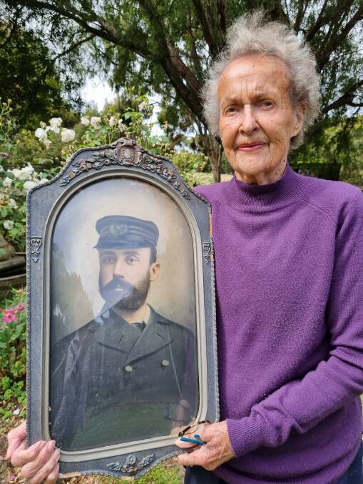 Esther Field with a portrait of her grandfather, captain Alexander Lusher. Picture supplied