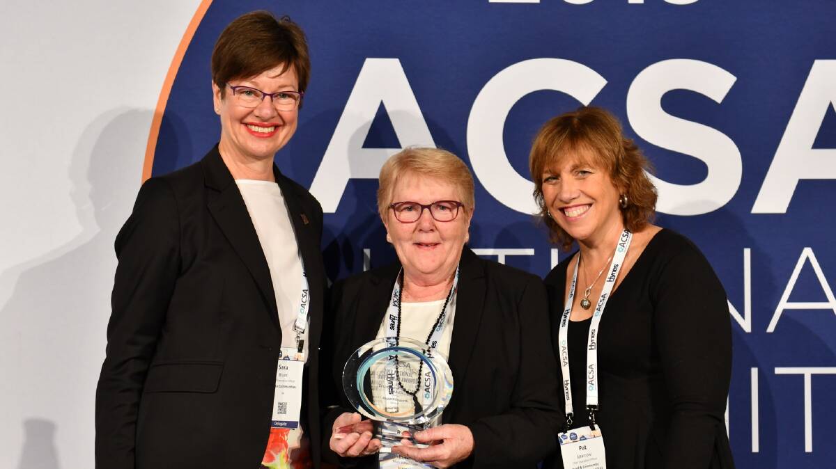 ACSA Board Chair Sara Blunt, Employee of the Year Juniper's Joyce Ashworth and ACSA CEO Pat Sparrow.