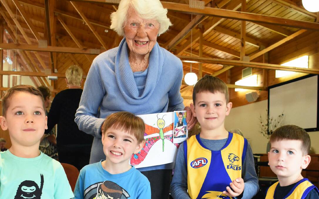 THE GENERATION GAME: Resthaven Bellevue Heights resident Jean Linehan, 103, with children from Montessori Kindy.