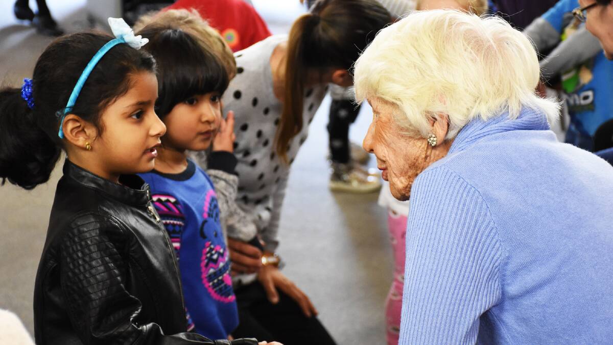 MEET AND GREET: Centenarian Jean Linehan greets the children at her aged care home.