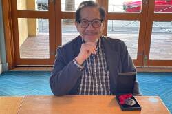 Tony Pang pictured with his Lifetime Community Service Medal. Photo by Rowan Cowley