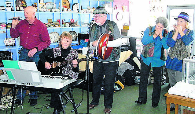 AND AWAY THEY GO – Music-makers  The JEMMMs get together at a Mary Gilmore Weekend in Crookwell. From left, Michael Delaney, Jill Jones, Mick Carren, Elaine Delaney and Maree Hayley.