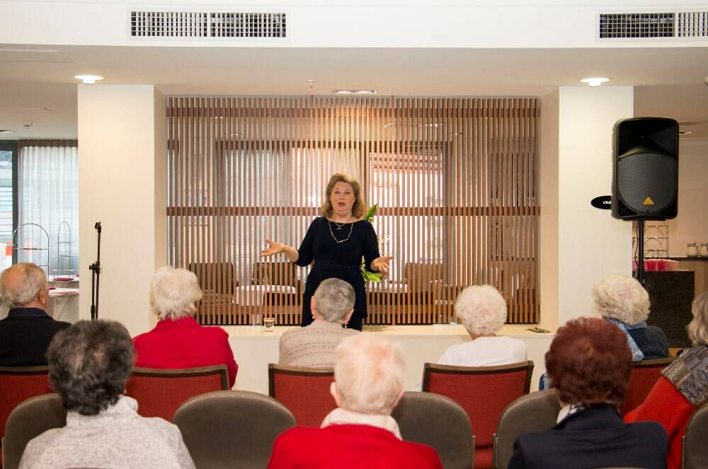 SHARED EXPERIENCE - Lifestyle guru Tonia Todman speaks to residents at Uniting AgeWell's Amarco Apartments in Kingsville, Victoria.