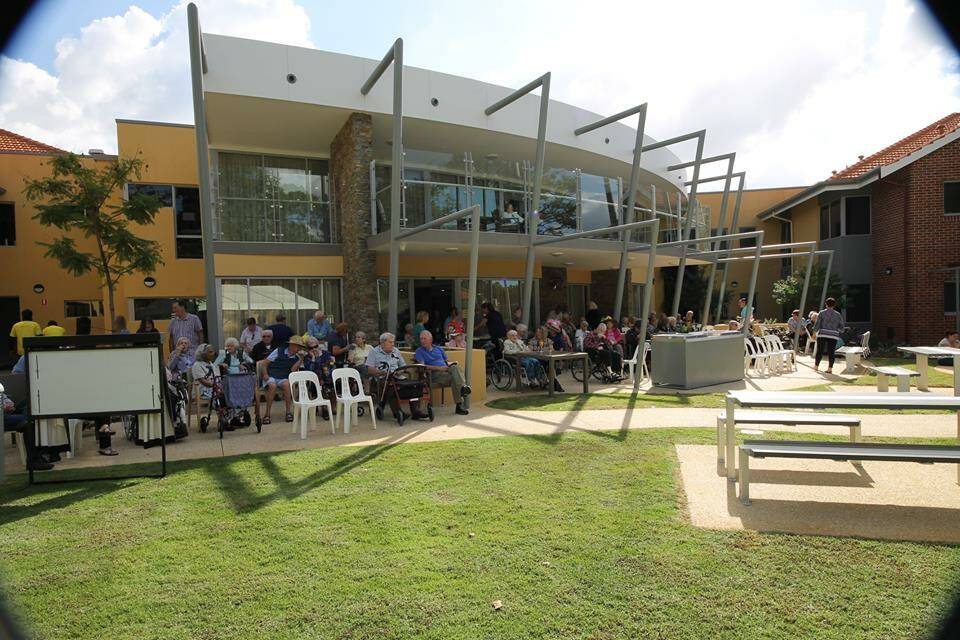 Residents, staff and family at the opening of the new facility.