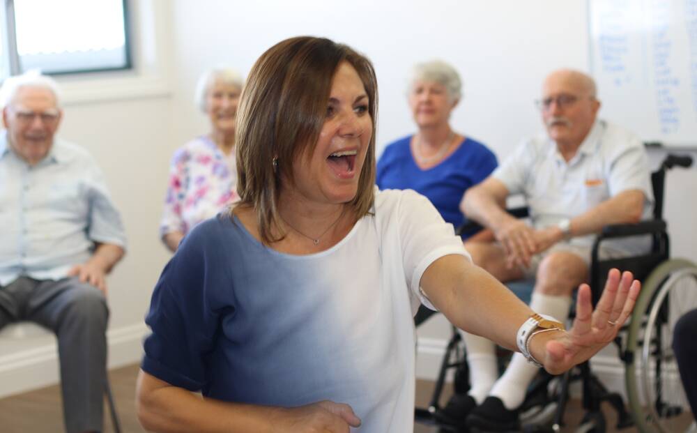 MOVE AND GROOVE – Sunshine Coast Dance Health Alliance instructor Leigh Leiman takes to the floor in her dance class for people with dementia at IRT Woodlands. Photo: Heather Grant-Campbell