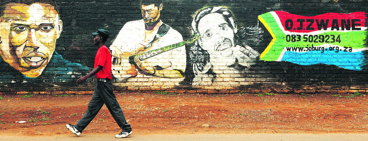 CHANGING ATTITUDES - many famous people have called Soweto home, reflected in the street art around the townships .