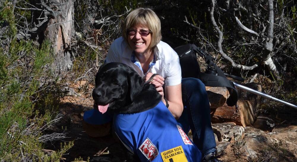 WHAT A TEAM – Karen Hosie with trainee guide dog Yoda at Mount Field National Park