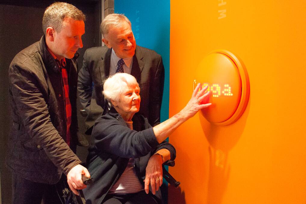 ON THE  BUTTON – From left, Social Buttons designer Jason Grant,  Caggara House tenant Valma Winterbottom and Brisbane Housing Company chief executive David Cant.