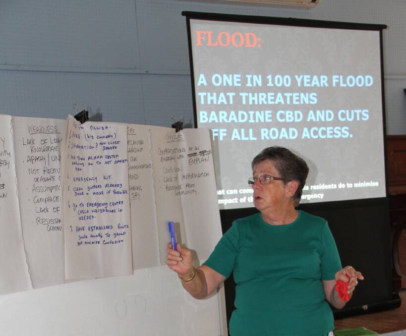 MUST-DO LIST – Baradine resident Lorraine Condon goes over the list of suggested subjects for discussion at one of the town’s workshops.