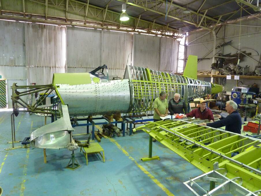 TAKING SHAPE – The Corsair being restored at the museum.