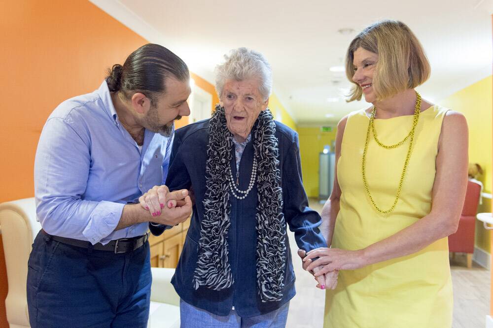 A NEW APPROACH – Carer Ahmed Selah with Sue and daughter Amanda Jackson at Mountain View Aged Care Plus Centre, one of two Salvation Army Aged Care Plus facilities to implement the new dementia care model. Photo: Jay Cronan