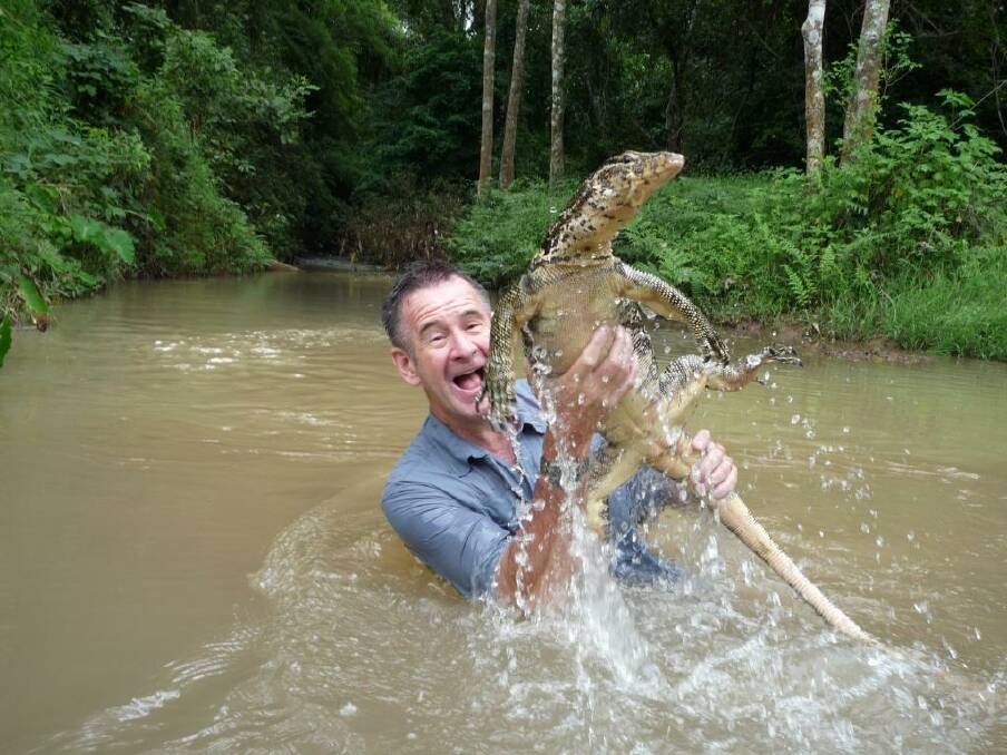 Nigel Marven with a water monitor. Photo: Matthew Wright.