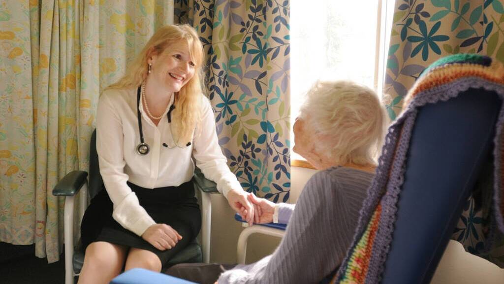 Professor Ruth Hubbard interacts with a patient. Picture University of Queensland