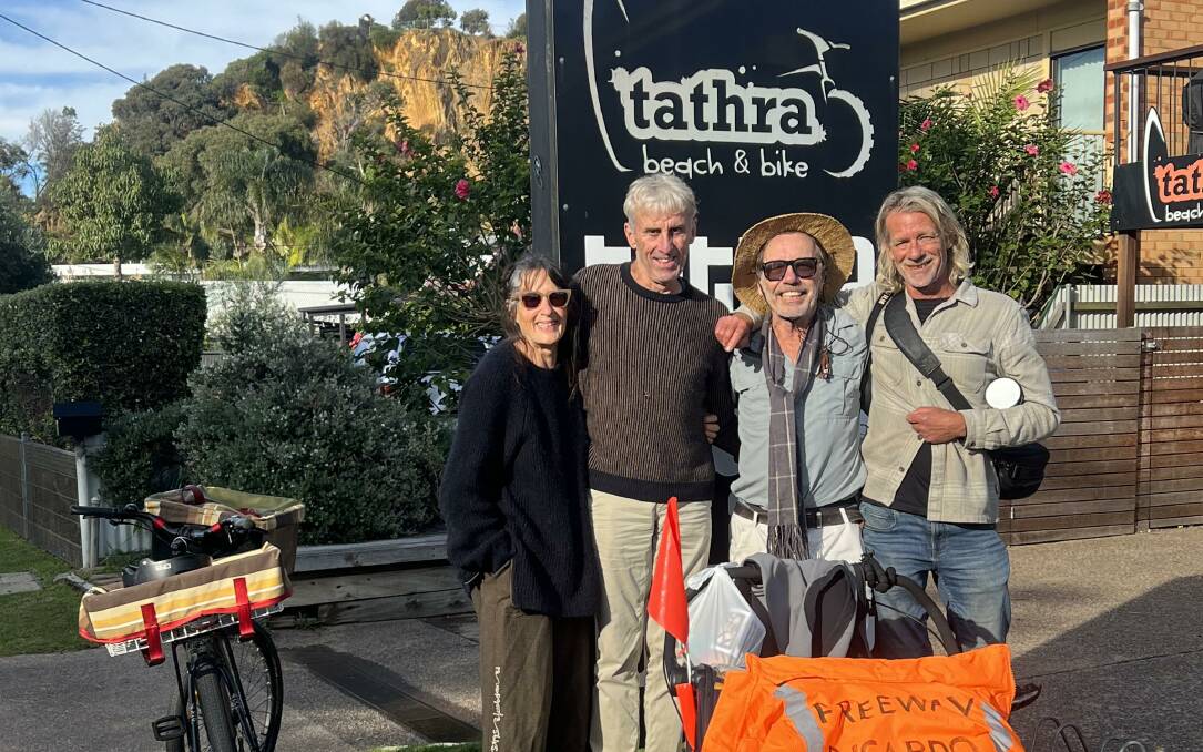Richard van Pijlen, 67, is currently walking through the Bega Valley Shire on his trek from Sydney to Perth. Here he is pictured with some friends and Tathra locals who treated him to a coffee on Sunday, May 29. Photo: supplied 