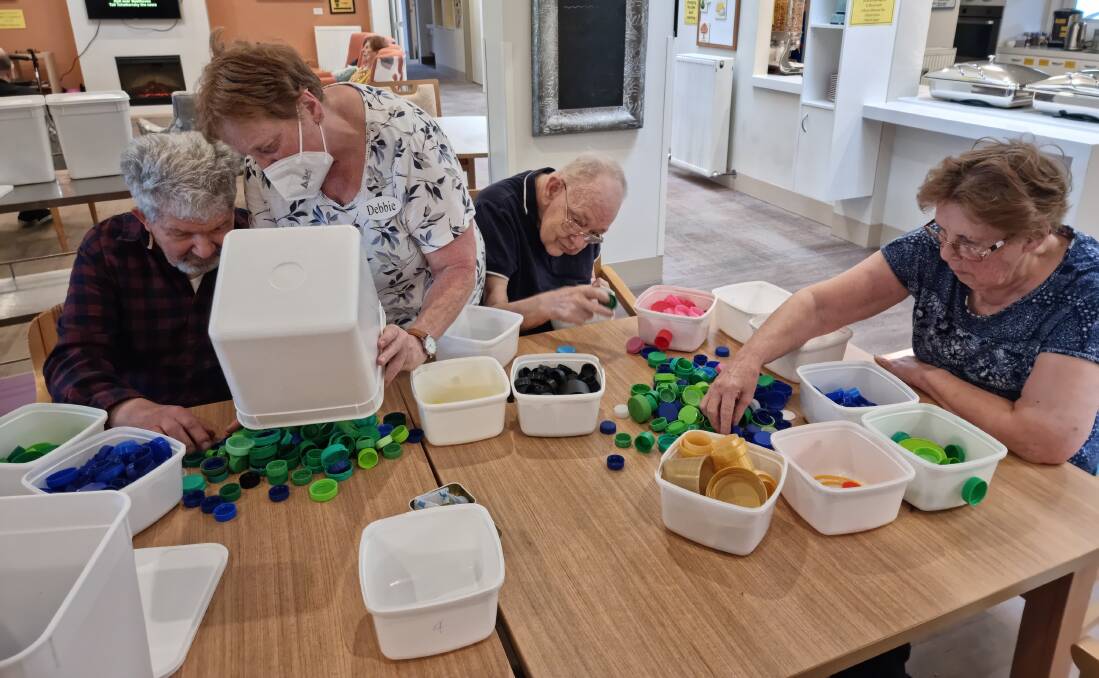 SORTING THE LIDS: The aged care recycling program is a win for residents and the environment.