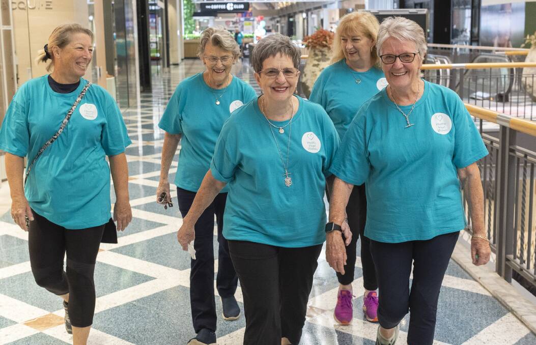 THEY'RE OFF: The Healthy Heart Walkers enjoy a stroll around Sunshine Plaza.