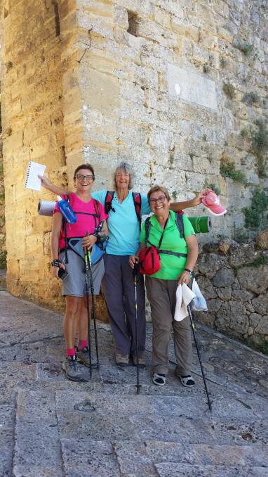 A-WALKING WE WILL GO: Heath de Burgh, centre, with fellow walkers on the ColleVald'Elsa to Monteriggioni trek in Italy.