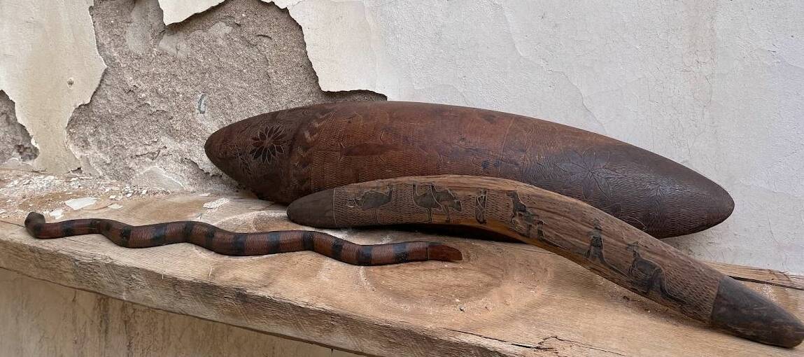 The three pieces - a snake, a boomerang and a shield - had been in Jenny Whiting's family since the 1960s. Picture: supplied. 