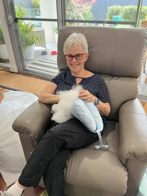 Zonta Club of Adelaide Torrens secretary Prue Cowled making a beast cushion. Picture supplied