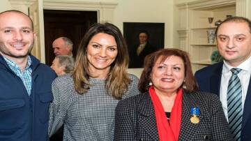 Tanya Kaplan OAM (second from right) with her son-in-law Sam Nicolitsi, daughter Filiz Nicolitsi and son Errol Kaplan at Government House, Adelaide, in 2017 when Tanya received her OAM. Picture supplied