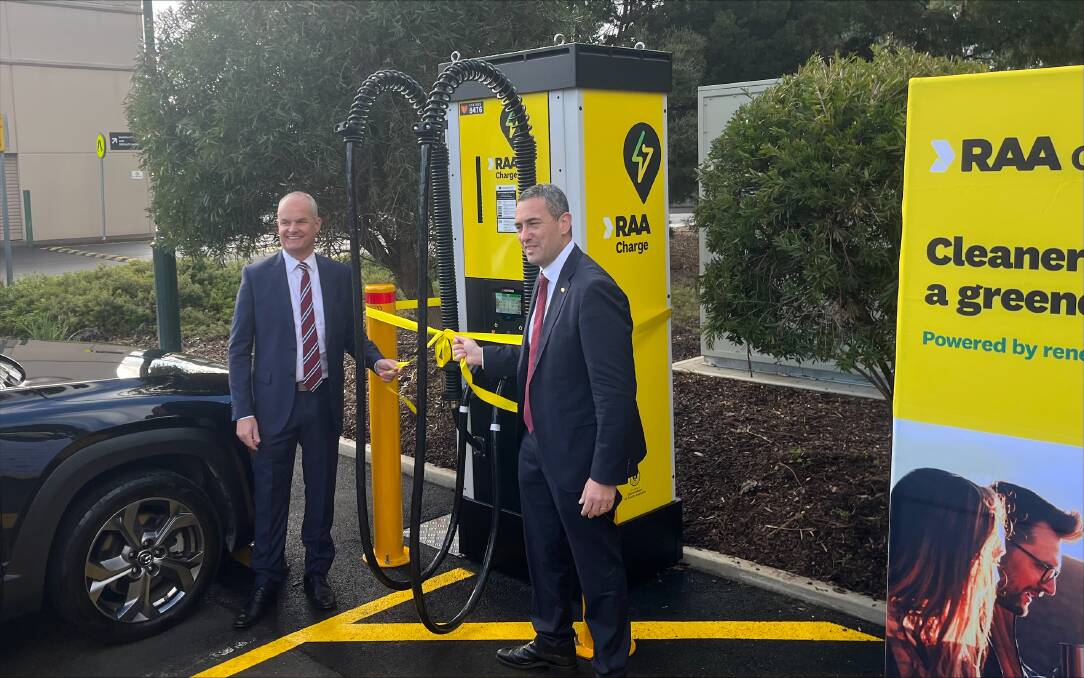 RAA chief executive officer Nick Reade and SA transport minister Tom Koutsantonis unveil an EV charger at Nuriootpa, SA, on Tuesday, July 4, 2023. Picture supplied