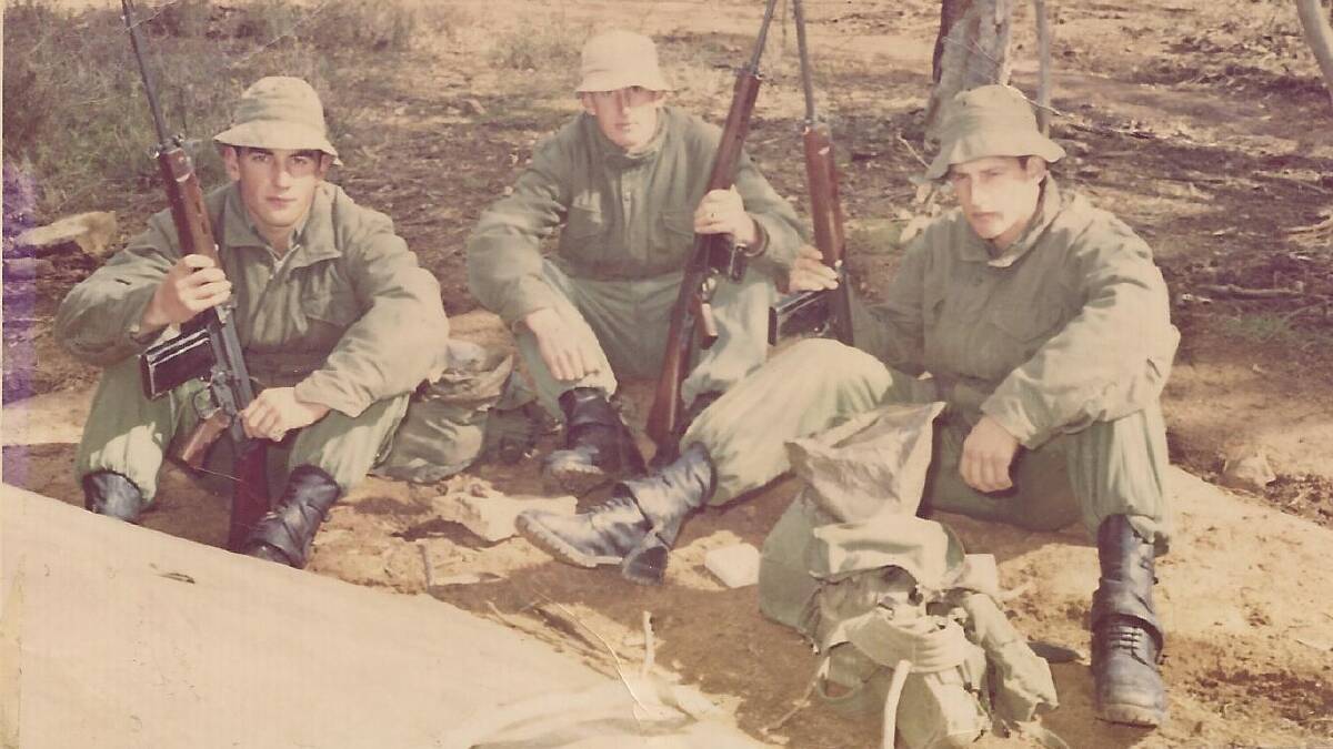 THEY SERVED TOO: Geoff Parkes, left, on a training exercise at Uranquinty, near Wagga Wagga, NSW, in 1971. 