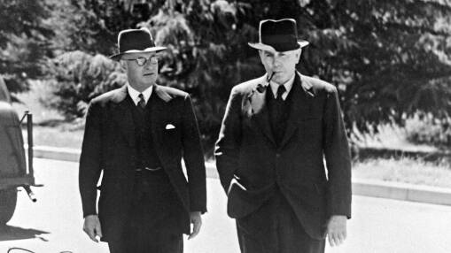 John Curtin and Ben Chifley walking between the Hotel Kurrajong and Old Parliament House, Canberra - circa 1945. Photo courtesy Don Stephens/NAA: A1200, L26035.