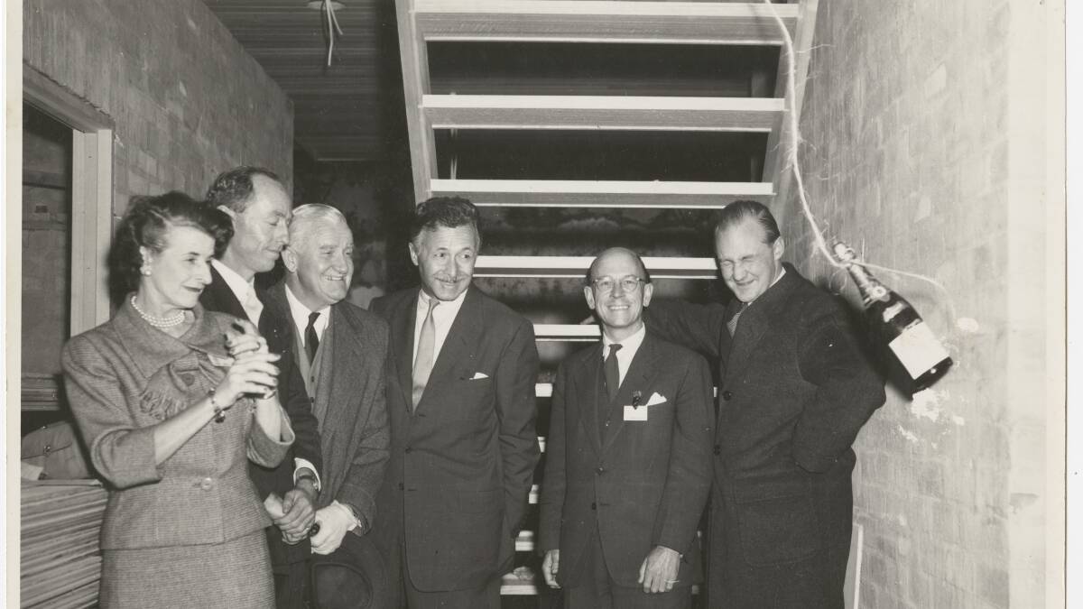 BUILT: Christening the house on May 29, 1956, are Lady Marion Hall-Best, Tony Gilbert, Sir John Hall-Best, Pietro Belluschi, Gavin Walkley and Robin Boyd. Image credit: State Library of South Australia: ACC 1118/30