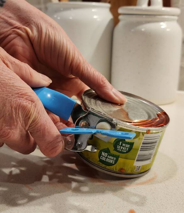 Opening a tin is often a no can do for seniors. Picture by Simon Cohen
