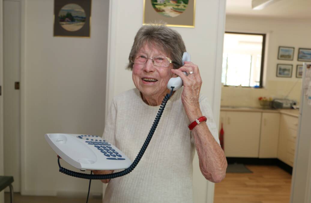 ACM file image of Anne Fordham of Dora Creek with her landline phone. Picture by David Stewart