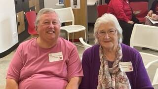 Telecross volunteer Jennifer Curnow and client Margaret Cooper are pictured at The Red Cross Telecross service's 50 years celebration in Adelaide in October 2022. Picture supplied