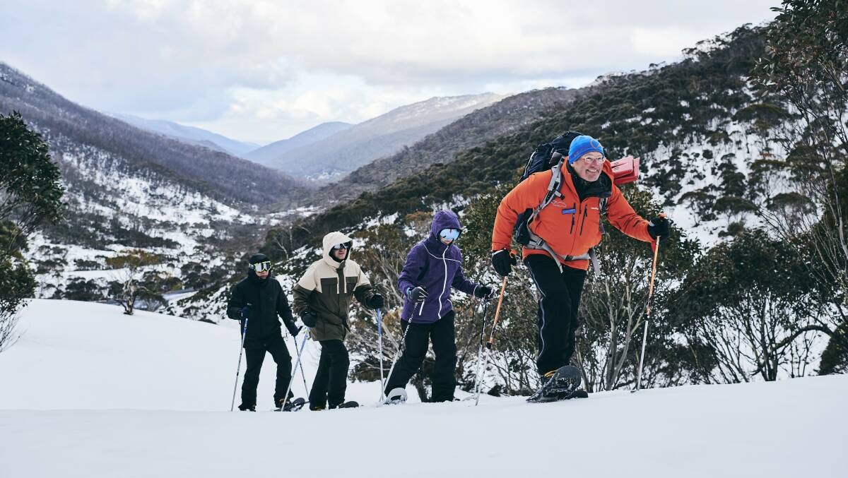 Group setting out on a snowshoe adventure through Dead Horse Gap, Thredbo in the Snowy Mountains. Photo credit: Destination NSW.