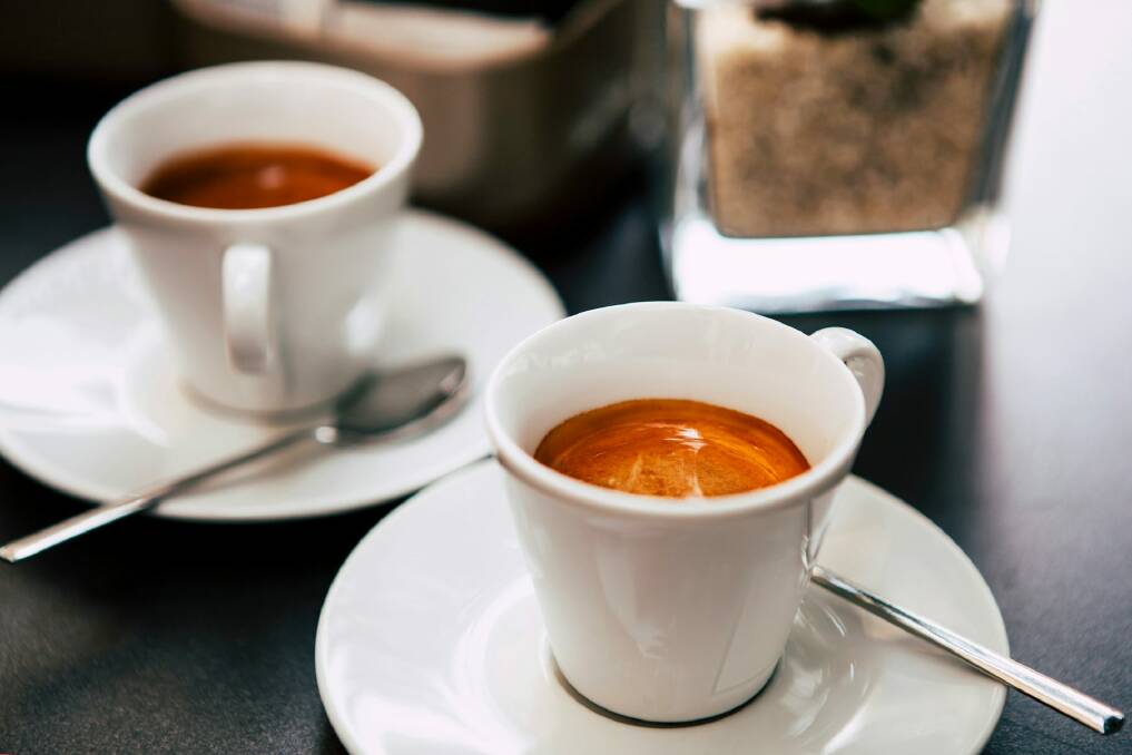 The crema is the thin golden emulsion that sits atop a quality espresso shot. Shutterstock