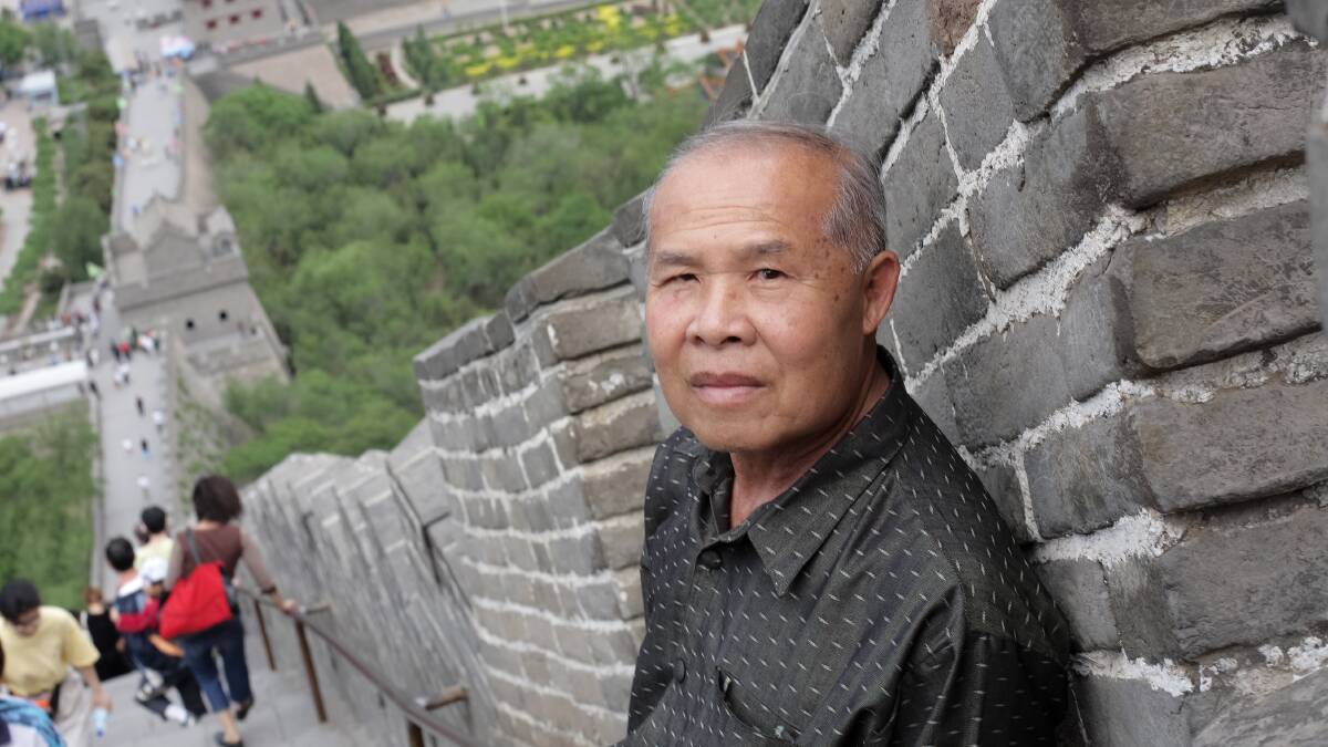 Kat Ditthavong, pictured at the Great Wall of China during a visit to his son Sitthixay Ditthavong undertaking language training in Beijing. Picture: Sitthixay Ditthavong