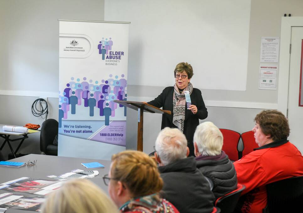 SAFETY FIRST: Kay Patterson AO speaking on elder abuse and sharing the new bookmarks at the Launceston School for Seniors on Wednesday. Picture: Paul Scambler
