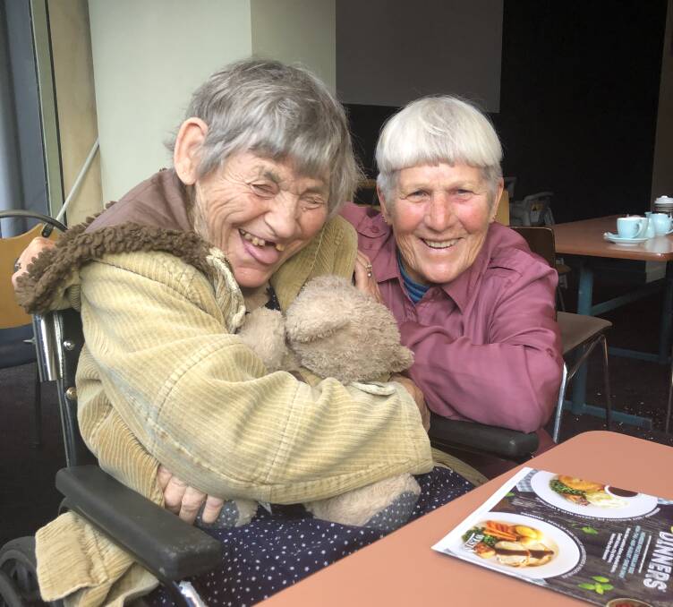  HAPPY HERE: Marea Bourke and her sister-in-law Judy Bourke at the Stockton Centre this week. Judy fears Marea will not receive adequate care in a group home. Picture: Wendy Cuneo