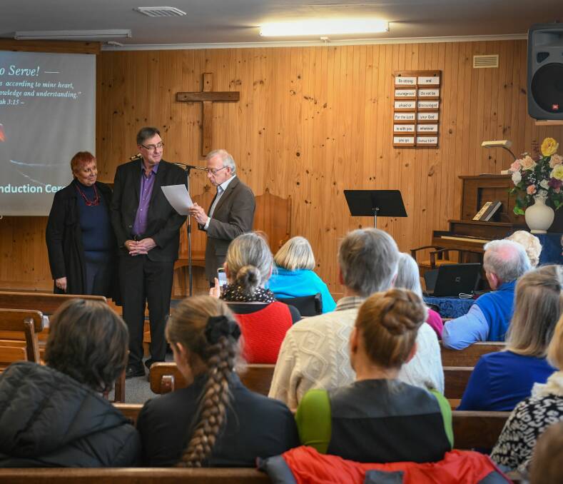 Induction: Sylvie and Bob Goolsby being inducted by Baptist regional minister David Roffe. Picture: Paul Scambler