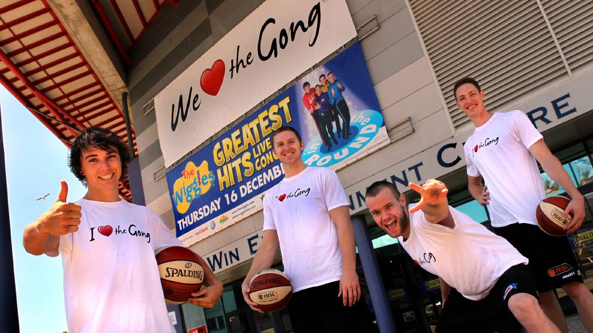 GONG, BUT NOT FORGOTTEN: Wollongong Hawks players Zac Delaney, Tin Coenraad, Larry Davidson and Tim Behrendorff in 'I love The Gong' T-shirts. Photo: Orlando Chiodo