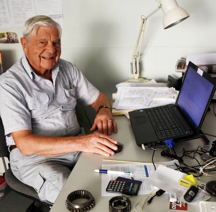 SWITCHED ON: Former mechanical engineer Stan, 85, enjoys working on his computer in his home office.