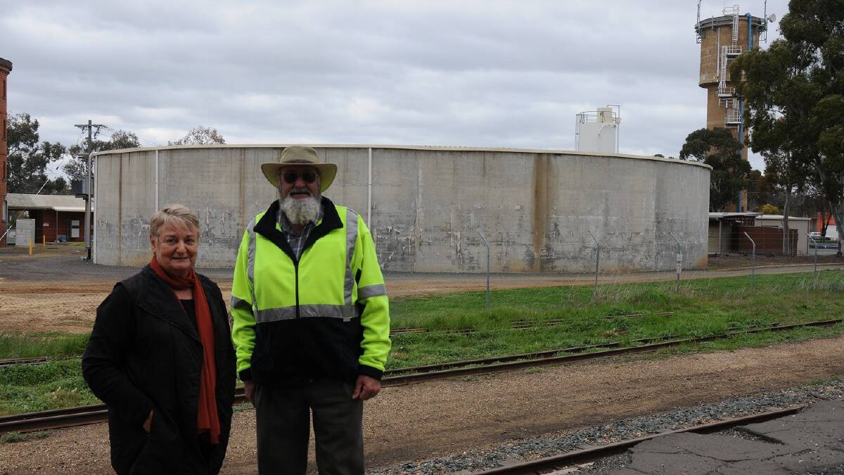 Kyabram Project Committee members Joy Salter and Allan Weeks in front of the Kyabram water tank which is set to get a makeover.