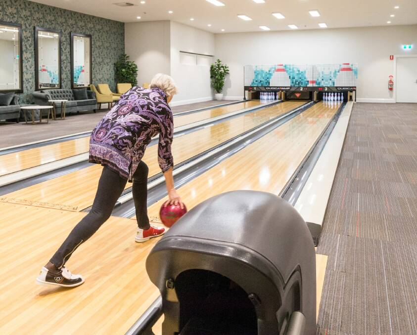 LANE CHANGE: The three-lane bowling alley is a popular place for residents of Living Gems Caboolture Riverside to spend time with family and friends.