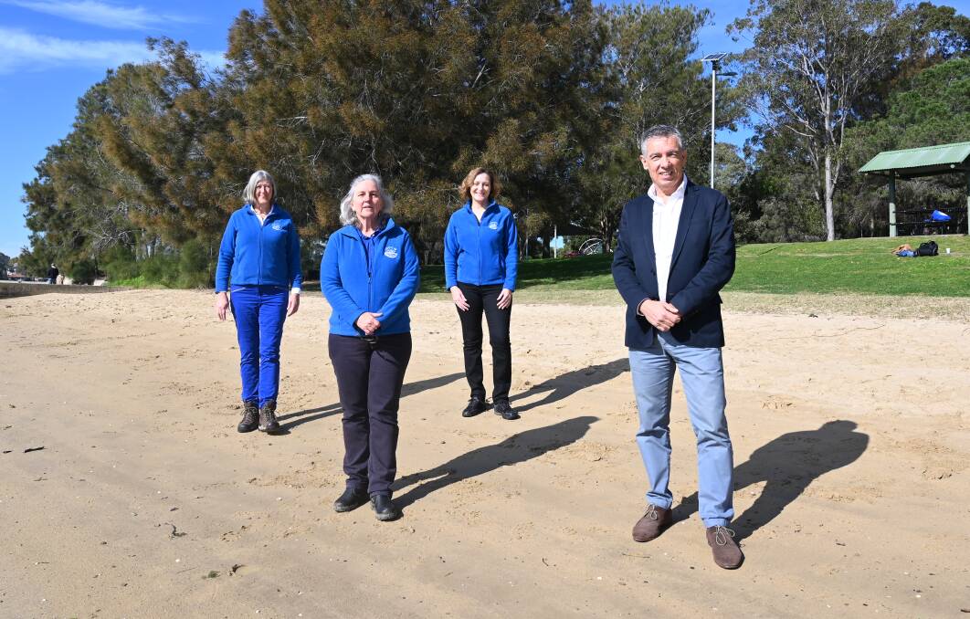 From left, Parramatta River Catchment Group's Jasmine Payget, Nell Graham and Nadia Young with City of Canada Bay Mayor Angelo Tsirekas at Bayview Park.