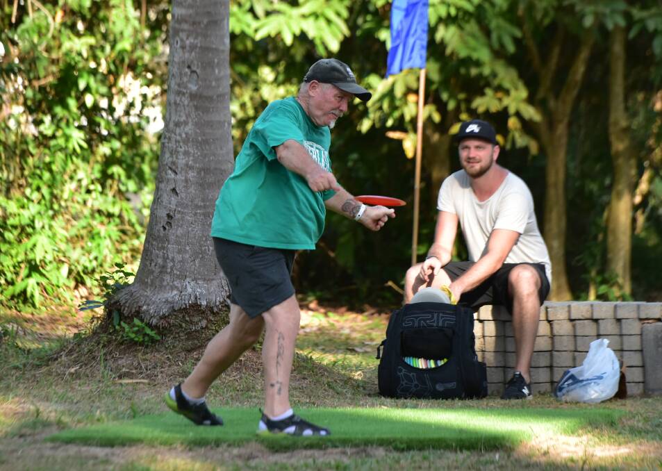 DISC JOCKEYS: Disc golf involves throwing a flying disc into baskets around a course. and is a good way to get moving and socialising. Photo: Canberra Ultimate
