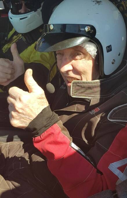THUMBS UP: Bruce was reluctant to get out of the car after going for a spin.