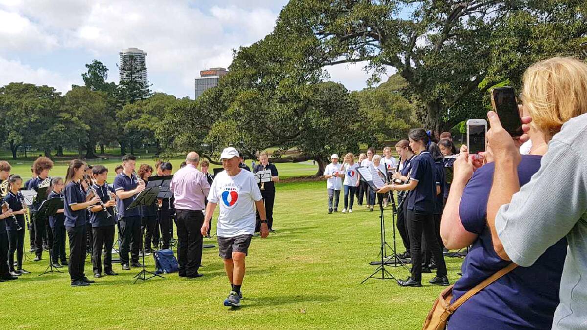 FANFARE: Chatswood High School Concert Band played as Alan crossed the finish line.