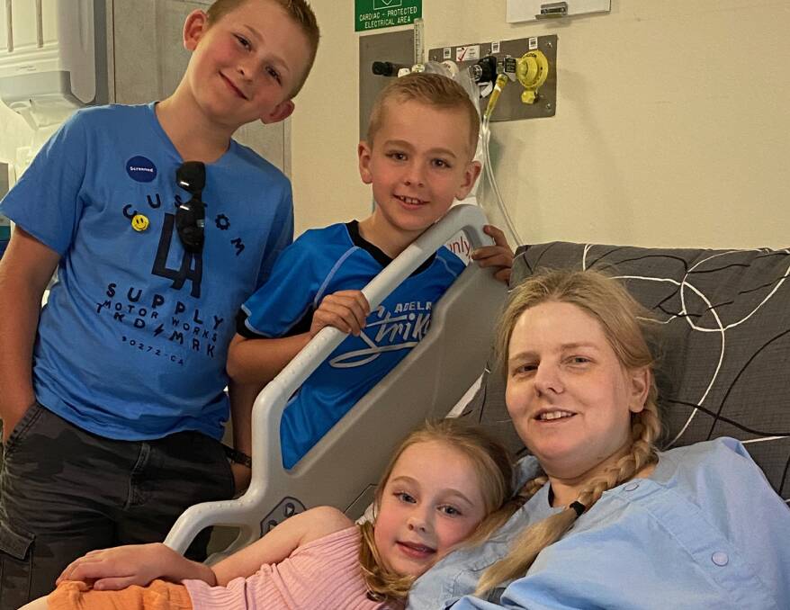 Nyree in hospital with nephews Mason and Xavier and niece Mila.