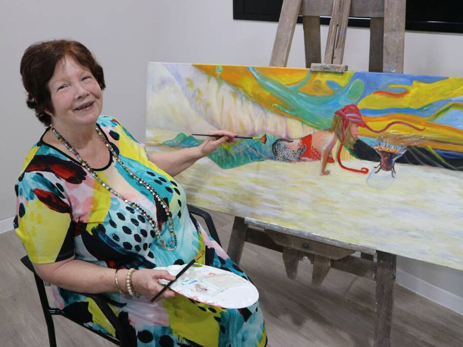 VIVID: Arcare Springwood resident and artist Dawn Crosby uses photos and images as inspiration for her colourful oil paintings. 