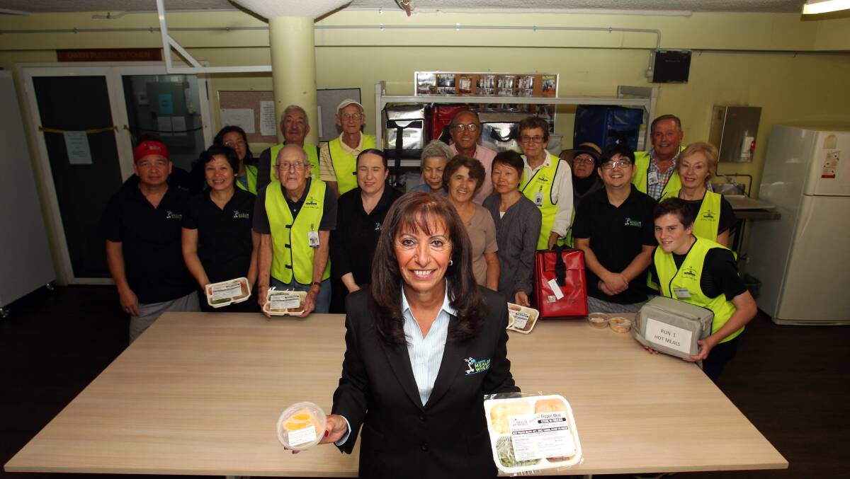 St George Meals on Wheels CEO Nahed Soliman with volunteers. Picture: Chris Lane